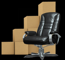 Office chair in front of a stack of card boxes